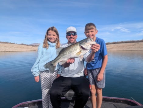 Family fishing trip with catch