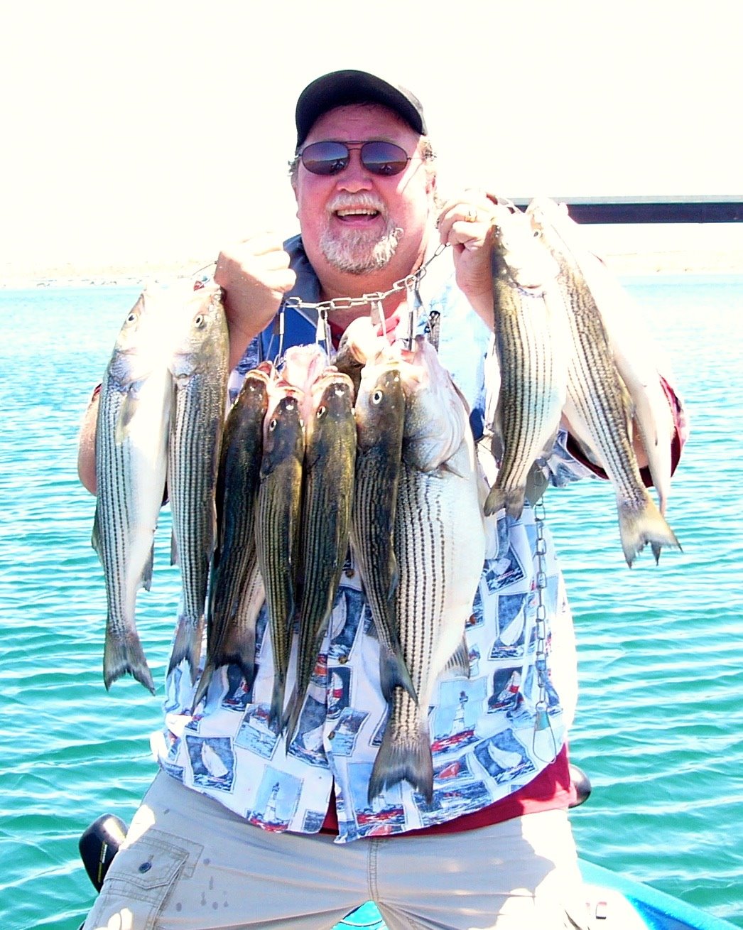 Photo showing customer with several fish - Best Arizona Fishing Guide